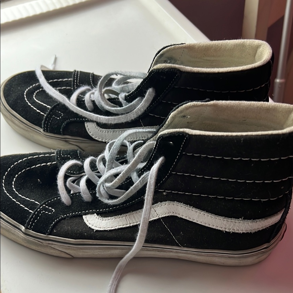 Vans Black and White High-Top Sneakers with Canvas Upper
